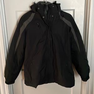 Women’s Nylon 2 in 1 winter jacket. 24" Sleeve, Pit to Pit 25", length 28" .